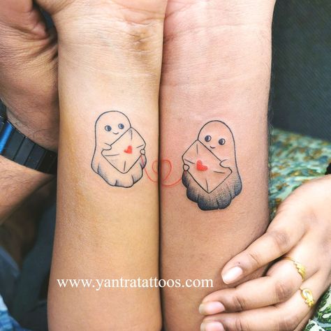 "Love beyond the veil: a tale of ghostly #love etched in #ink and sealed with heartfelt letters." 💌👻💉 #tattooing #yantratattoos #strengthinletters #tattoooftheday #InkedLoveStories #GhostlyRomance #LetterLoveAffair Ghost Tattoos Couple, Halloween Matching Tattoos Couples, Matching Halloween Tattoos For Couples, Spooky Matching Tattoos For Couples, Ghost Couple Tattoo, Anime Couple Tattoos, Girly Hand Tattoos, No Tattoo, Moving On Tattoos