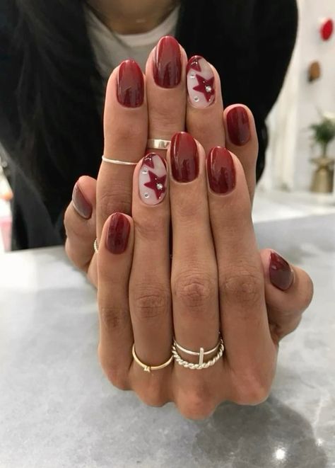 Cool Girl Christmas Nails, Red Biab Nail Designs, Deep Red Nails With Design, Maroon Star Nails, Cherry Red Nails With Design, Red Eras Tour Nails, Cool Girl Nails Aesthetic, Short Almond Nails Designs Fall 2024, Classy Nail Inspiration