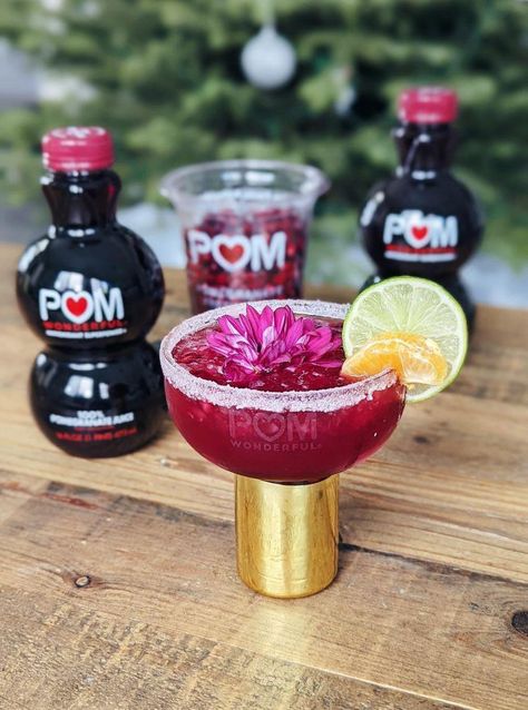 Pom Juice, Pom Wonderful, Holiday Cocktail, Holiday Cocktail Recipe, Spiced Rum, Pomegranate Juice, Lime Wedge, Beer Bar, Holiday Drinks