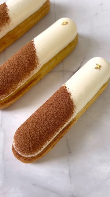 World of Eclairs on Instagram: "Tiramisu eclairs in the making🤎☕️ Do you think tiramisu is more a summer☀️ or a winter time❄️ dessert? #frenchpastry #dessertvideo #bakingreel #bakingrecipe #eclair #eclairs #instapastry #pastrycheflife #dessertaddict #sweettooth #chouxpastry #patisserie #эклеры #эклер #tiramissu #coffeedessert #trendingreelsvideo #trendingreel" Eclair Tiramisu, Eclairs Decoration, Eclair Decoration, Tiramisu Eclairs, Eclairs Recipe, Eclair Dessert, Eclairs Dessert, Fancy Desserts Recipes, Eclair Recipe