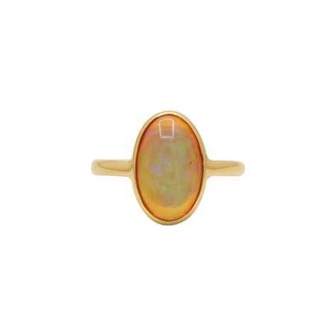 Natural High Quality Ethiopian Opal Gemstone 18k Solid Yellow Gold Handmade Rings Jewelry Item Type: Ring ----------------------- Stone: Ethiopian Opal --------------------------- Stone Color: Multi-Color ----------------------------- Stone Size: 14x9 ------------------------ Stone Cut: Faceted --------------------------- Shape: Oval --------------------------- Transparency: Translucent -------------------------------------- Natural/Lab-Created: Natural ----------------------------------------- Wedding Ring Luxury, Opal Jewelry Ring, Oval Opal Ring, Gem Stone Ring, Minimalist Silver Ring, Handmade Gold Ring, Yellow Ring, Ring Luxury, Luxury Ring