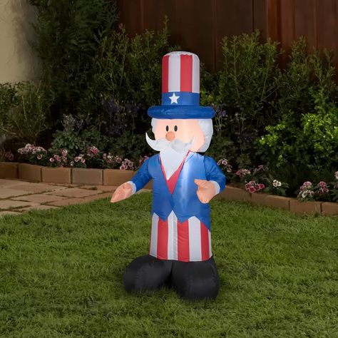 Purchase the 4ft. Airblown® Inflatable Fourth of July Uncle Sam at Michaels. com. Standing straight and sure, Uncle Sam is ready for the celebration brightly dressed in his red, white, and blue stars and stripes outfit. Entertain neighbors and friends for the Fourth of July holiday with this light-up Airblown inflatable character. Standing straight and sure, Uncle Sam is ready for the celebration brightly dressed in his red, white, and blue stars and stripes outfit. A single white LED light prov Holiday Yard Decorations, Fourth Of July Decorations, July Holidays, Mini Lights, Outdoor Inflatables, Outdoor Holidays, Uncle Sam, Holiday Art, The Holiday Aisle