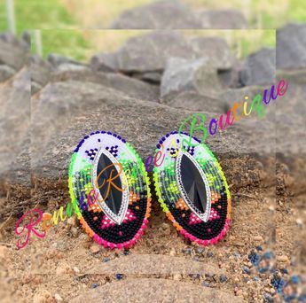 Neon beaded horse eye acrylic gems. Backed with leather on fingernail posts. Measures approximately 1.5 in in overall length.  Smaller pair to be made at request of buyer. Beaded Horse, Beads Jewelry Making Tutorials, Horse Eye, Beadwork Designs, Native Beadwork, Acrylic Gems, Handmade Earrings Beaded, Beadwork Patterns, Jewelry Making Tutorials