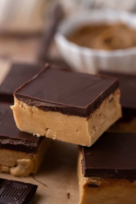 This buckeye bars recipe combines thick layers of chocolate and peanut butter mixture together to create a guaranteed fan favorite! Peanut Butter Squares Recipe, Buckeye Bars Recipe, School Lunchroom, Butter Squares, Peanut Butter Squares, Peanut Butter Dessert Recipes, Peanut Butter Chocolate Bars, Square Recipes, Chocolate And Peanut Butter