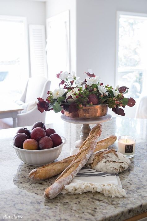 Warm and Inviting Fall decor color scheme with copper, burgundy, deep plum purple, burnt orange and white. A simple and cozy Autumn home. Burgundy, deep plum purple, copper, white and burnt orange are the colors I picked for my Fall decor this year and I am loving how moody and romantic they are together. I love everything about Fall. I love the cool crispness that creeps into the air, the football games, the warm pots of soup, delicious pumpkin recipes, apples, hayrides, and snuggling with my Pumpkin Tablescape, Wine Decor Kitchen, Wine Kitchen, Decor Color Schemes, Fall Kitchen Decor, Pumpkin Spice Cake, Fall Kitchen, Kitchen Design Decor, Spice Cake