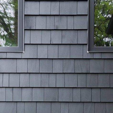 Buchner Manufacturing on Instagram: "Black is a classic exterior colour choice but pairing it with all black trims gives it a super modern look. We're loving @lemontree_interiors 's house! She used Fraser Wood Siding's Cedar Shingles in the colour Iron Ore. Check out her Instagram and when you're ready to make your house look as amazing as hers, visit your local Buchner Manufacturing to order your Fraser Siding! 🖤🏡 . @frasersiding 🖤 . . . . . . #home #architecture #cedarshakes #woodsiding #cu Black Vinyl Shake Siding, Painted Shingle Siding, Black Shake Siding Exterior, Black Shingle House, Black Shaker Siding Exterior, Black Shake Siding, Black Cedar Shake Siding, Painted Cedar Shake Siding, Cedar Siding Exterior Colors