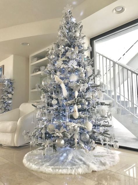 100 White Christmas Decor Ideas Which are Effortlessly Elegant & Luxurious - Hike n Dip White And Light Blue Christmas Tree, Christmas Decor Ideas White And Blue, White Christmas Tree Blue Lights, All Silver Christmas Tree, Modern Blue Christmas Tree, Silver And Light Blue Christmas Tree, Blue And Silver Flocked Christmas Tree, Silver White And Blue Christmas Tree, White Silver And Blue Christmas Tree