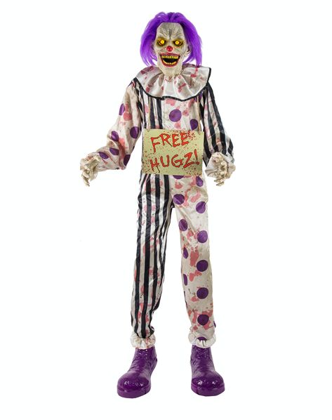 Hugz the Clown was an animatronic sold by Spirit Halloween for the 2018 and 2019 Halloween seasons as well as online for the 2020 season. It resembled a clown that wore a multi-colored suit, purple shoes, and a purple wig, as well as a "Free Hugz!" sign around its neck written in apparent blood. When activated, it moved its mouth to one of several phrases before, and after, lunging its upper half forward with its arms outstretched. "Welcome to the fun house! Hugz the Clown may seem like a ... Spirit Halloween Animatronics, Halloween Decorations Uk, Halloween Props Scary, Halloween Spirit Store, Halloween Decorations To Make, Halloween Animatronics, Suit Purple, Halloween Costume Store, Halloween Clown