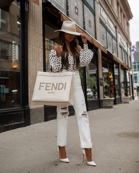 fashion blogger mia mia mine wearing polka dot off-the-shoulder top, distressed white denim, and Fendi tote. check out my blog for more concert outfit ideas. #casualootd # Maria Vizuete, Wear To A Concert, Mia Mia Mine, Givenchy Sunglasses, Cute Slides, Chanel Espadrilles, Style Wide Leg Pants, Mia Mia, Christian Louboutin So Kate