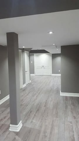 Gray And White Living Room, Light Grey Flooring, Bappa Photo, Basement Colors, Basement Redo, Basement Living, Grey Wood Floors, Basement Living Rooms, Basement Renovation