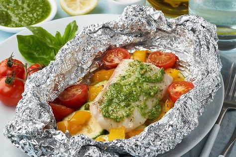 How To Cook Cod In The Oven With Foil - Recipes.net Cod In The Oven, Best Cod Recipes, Fish In Foil Packets, How To Cook Cod, Haddock Recipes, Foil Packet Meals, Foil Packet, Cod Recipes, Acidic Foods