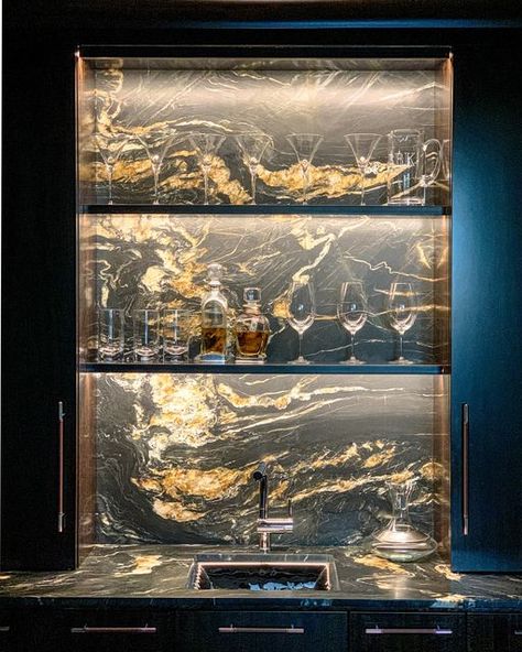 Bluebell Kitchens on Instagram: "Wall art. Literally. Integrated lighting makes the most of this bar nook’s stone counter and backsplash, illuminating the amazing color and grain. Honed matte finishes like this eliminate that harsh, annoying glare. . . . #bluebellkitchens #customkitchendesign #kitchendesignideas #kitcheninspo #philadelphiakitchens #stonecountertops #stonebacksplash #homebar #homebardesign" Bar With Quartz Backsplash, Backlit Marble Bar, Basement Bar Backsplash, Stone Bar Counter, Bar Backsplash Ideas, Backlit Bar, Instagram Wall Art, Bar Nook, Stone Counter