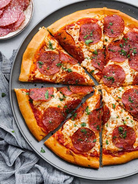 Salami Pizza is a quick and easy recipe that is sure to satisfy the whole family! A homemade pizza with all the flavor of your favorite pizzeria that is ready in just under 30 minutes, this salami pizza is definitely going to be one you come back to again and again. Pizza Seasoning Recipe, Pizza Calzones, Pizza Salami, Salami Recipes, Salami Pizza, Meat Lovers Pizza, Pizza Dough Recipe Easy, Easy Pizza Dough, Whole Wheat Pizza