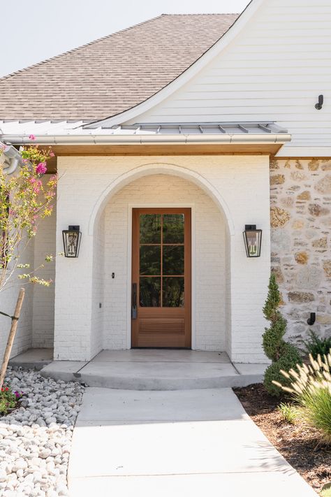 The Modern Cottage — MICAH ABBANANTO English Country Cottage Exterior, Modern Cottage Exterior, Tuscan Cottage, Mediterranean Cottage, Arch Entryway, Arched Entry, Brick Porch, Cottage Vibes, European Cottage