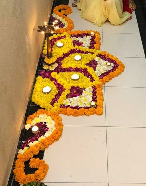 Flower Rangoli On Stairs, Flower Border Rangoli Design, Simple Rangoli With Flowers Petals, Rangoli With Flowers Petals For Diwali, Flower Petal Rangoli Designs, Border Flower Rangoli, Phool Rangoli Designs, Rangoli From Flower Petals, Corner Flower Rangoli