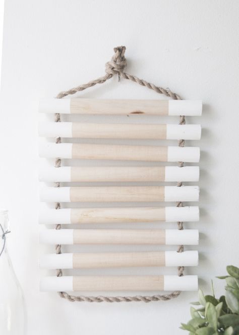 Who knew there were so many ways to use wood dowel rods? Expandable trivets, minimal coat racks, Eames-inspired mobiles, and a whole lot more.    #How-To, #dowel rod Trivets Diy, Homemade Generator, Diy Generator, Diy Rope Basket, Diy Home Accessories, Diy Porch, Acrylic Craft Paint, Work Diy, Wooden Utensils