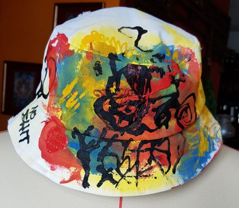 Graffiti Art on bucket hat. Spice up your streetwear. Limited edition. Only on http://graffitiartwear.etsy.com/ Bucket Hat Custom, Basquiat Graffiti, Cute Bucket Hats, Mens Accessories Necklace, Custom Bucket Hats, Bucket Hat Fashion, Dope Hats, Nerd Fashion, Michel Basquiat