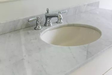 How to Change the Color on an Old Cultured Marble Vanity Top | Hunker Cultured Marble Shower, Vanity Redo, Cultured Marble Countertops, Marble Shower Walls, Bath Surround, Light Granite, Outdoor Kitchen Countertops, Cultured Marble Vanity Top, Marble Showers