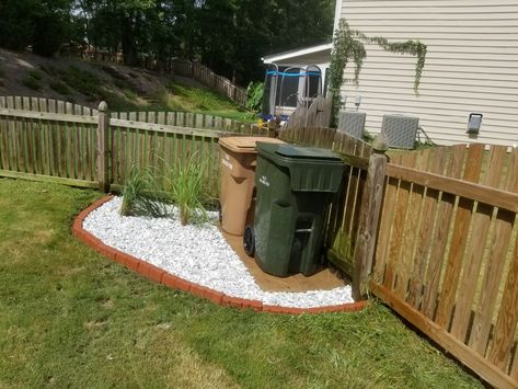 Backyard Rocks and Paver Ideas Garbage Can Paver Pad, Backyard Paver And Grass Ideas, Paver Area For Trash Cans, Large Pavers With Grass In Between Diy, Stone Pavers With Grass In Between, Backyard Rocks, Paver Ideas, Lawn Ideas, Landscaping Around House