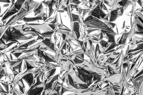 Whether you use it for cooking or storing leftovers, aluminum foil is a kitchen mainstay. But could it also be bad for you? Medicine Packaging, Foil Packaging, Bone Diseases, Aluminium Foil, Silver Background, Aluminum Can, Medicine Boxes, Tin Foil, Wrap Recipes