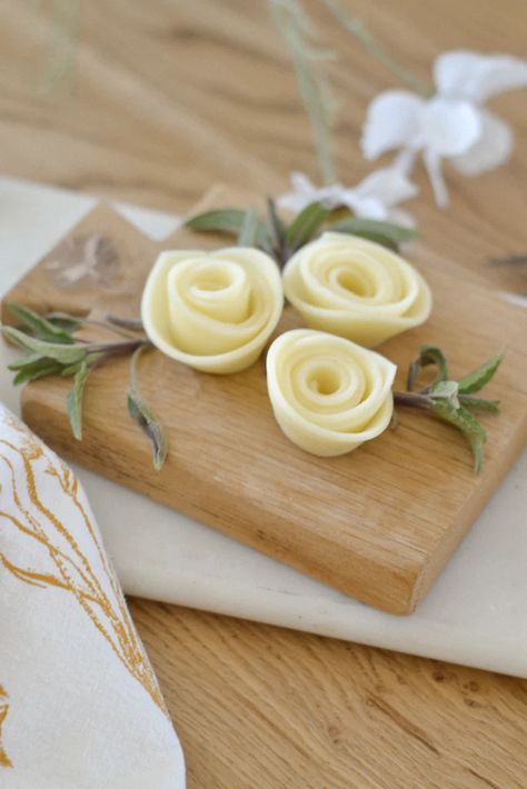 DIY Cheese Flowers – Aimee Weaver Designs How To Make A Cheese Flower, Meat Flowers Diy, How To Make Meat Flowers, Cheese Cuts For Charcuterie, Charcuterie Flowers How To, Cheese Flowers, Charcuterie Flowers, Cheese Rose, Meat Flowers