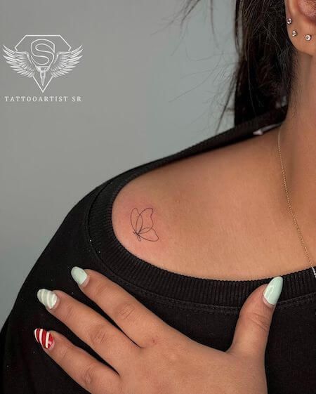 Butterfly Tattoo Meaning [2023] And The 110+ Most Beautiful Butterfly Tattoo Designs You'll Love Marigold Butterfly Tattoo, Tattoo Butterfly Meaning, Small Tattoos With Meaning Butterfly, Italian Butterfly Tattoo, Small Butterfly Tattoo Shoulder, Dainty Butterfly Semicolon Tattoo, Butterfly Meaning Tattoo, Butterfly Tattoo Dainty, Singular Butterfly Tattoo