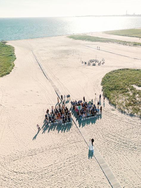 The floral chandelier stood out against crisp white and navy at this New England Kalmar Village wedding that used the boardwalk as a wedding aisle.  #beachwedding #weddingaisle Blue Wildflower Wedding, Village Wedding, Floral Chandelier, Ceremony Ideas, Wildflower Wedding, Wedding Aisle, Cape Cod, Beach Wedding, New England