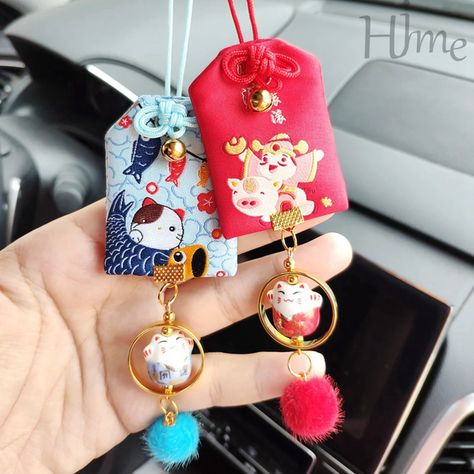 What Is Omamori and How Are They Used? - Symbol Sage Japan Traditional, Lovely Car, Kawaii Accessories, Maneki Neko, Cute Keychain, Traditional Interior, Lucky Cat, Car Charms, Fantasy Jewelry