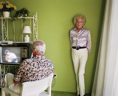 Larry Sultan I like this image because of the mood it conveys. The husband and wife appear to be indifferent to each other. Some things indicate they are close, and are amrried etc, such as the similarities in the clothes and the like. However, teh husband unwavering attention to the TV set, and the wife's pose suggest a cold, rather unloving relationship. Although they are pictured as being very close, you get the idea that they don't really get on, or talk that much. Larry Sultan, Sultan Pictures, David Alan Harvey, Milwaukee Art, Milwaukee Art Museum, Robert Mapplethorpe, San Francisco Museums, Family Album, Museum Of Contemporary Art