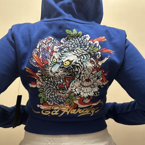 Blue Ed Hardy Hoodie
      
Size: S  
         ... - Depop Ed Hardy Hoodie, So Grateful, Ed Hardy, Hoodie Top, Sweatshirt Shirt, Jean Shirts, Casual Skirts, Dress With Sneakers, Sneaker Boots