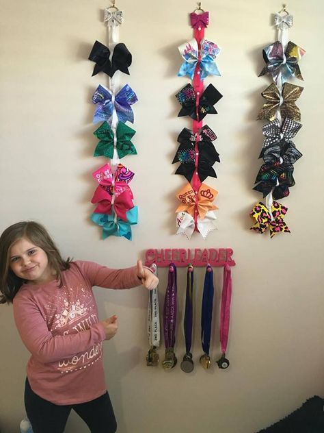 Cheerleading Medal Display Ideas, Display Cheer Bows, Cheer Metal Display Ideas, Pom Pom Holder Cheer, Cheerleading Bedroom, Cheer Medal Holder, Cheer Wall, Cheers Theme, Surviving Summer