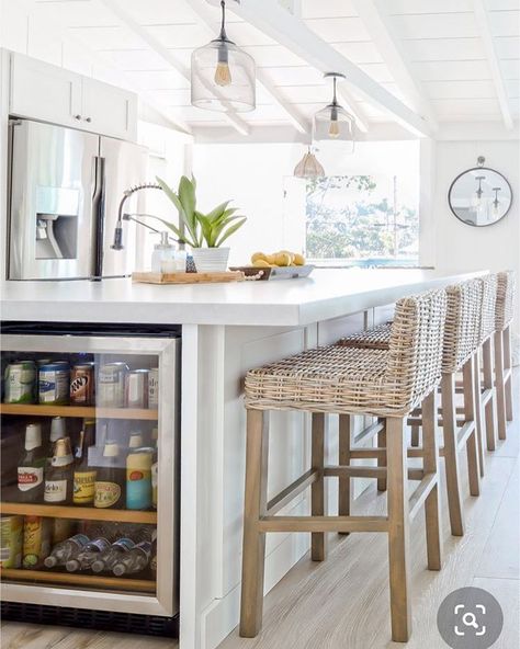 Actually Ashley on Instagram: “Loving this calm, cool and collected kitchen that is making me want to move to the beach #igdecor #southernliving #whitedecor…” Built In Wine Fridge Island, Diy Kitchen Island With Wine Fridge, Fridge In Island Kitchen, Kitchen Island With Bar Fridge, Bar Fridge In Kitchen Island, Kitchen Island Fridge, Wine Fridge Kitchen Island, Kitchen Island Ideas With Wine Fridge, Island With Stools Underneath