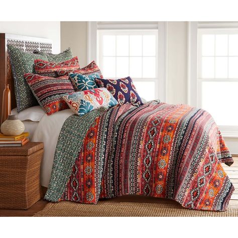 The Vista Reversible Twin Quilt Set by Levtex Home is inspired by traditional global rugs. Offered in shades of orange, green, red and black, this design will immediately transform your bedroom. Made with the softest lightweight rayon, this reversible quilt features an updated take on Southwest motifs from on the one side, reversing to a green stamped print in cotton on the other. The Twin Quilt Set has a cotton rich filler (90% cotton, 7% rayon, 3% other fibers) and is machine washable and incl Alaska House, Bohemian Quilt, King Quilt Sets, Lake Cabin, Striped Quilt, King Pillows, Twin Quilt, King Quilt, Reversible Quilt