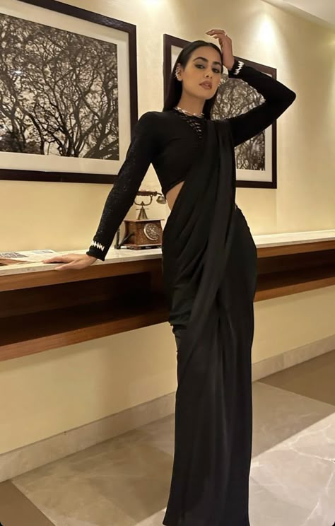 Black Color Blouse Designs, Minimalist Saree Look, Black Satin Saree Look, Black Saree Jewellery Ideas, Black Sarees For Farewell, Saree With High Neck Sweater, Saree With Turtle Neck Top, Black Saree With Hijab, Black Saree Look Modern