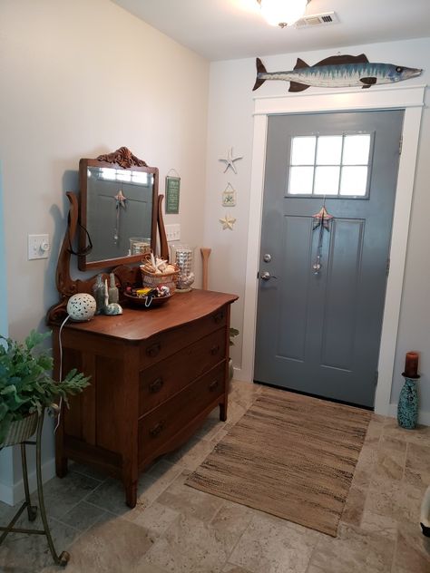 Entry way with antique dresser Antique Dresser In Living Room Decor, Dresser At Entryway, Dresser In Foyer Entryway, Mudroom With Dresser, Antique Dresser Entryway, Antique Dresser In Living Room, Dresser Entryway Ideas, Dresser In Entryway, Goth Farmhouse