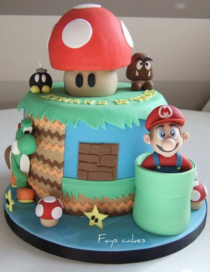 Super Mario Fun: You can almost hear the theme song playing upon setting eyes on this magnificent Super Mario Brothers cake. With an authentic looking Mario and plenty of mushrooms, it will the lil gamers' favorite cake ever!  Source: Flickr User Fays cakes Super Mario Cake, Mario Cake, Cake Wrecks, Unique Birthday Cakes, Cupcakes Decorados, Decorative Cakes, Fun Cakes, Crazy Cakes, A Birthday Cake