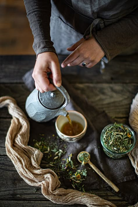 Herbal tea. Cottagecore Tea Aesthetic, Tea Brewing Aesthetic, Tea Photography Aesthetic, Herbal Remedies Aesthetic, Tincture Photography, Making Tea Aesthetic, Apothecary Photoshoot, Tea Shop Photography, Tea Leaves Aesthetic