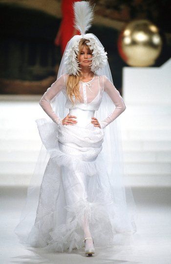 CLAUDIA SCHIFFER wearing the Chanel Bridal Gown at the Spring 1994 Couture Show This look from the Spring 1994 Couture show is the perfect dress option if you’re headlining your Vegas showgirl act right after you elope at a little white chapel. | Karl Lagerfeld's Muses: See Every Model Who's Worn the Iconic Chanel 'Wedding Dress' on the Runway Chanel Wedding Dress, Chanel Wedding, Mode Chanel, Couture Looks, Couture Wedding Gowns, Chanel Couture, Chanel Haute Couture, Couture Mode, Claudia Schiffer