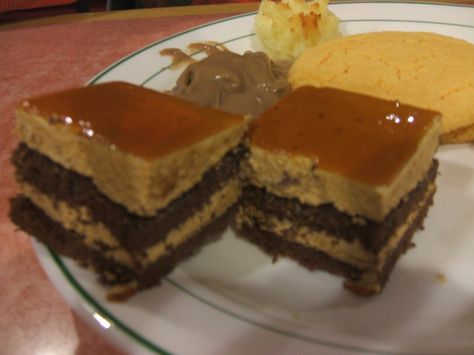 https://flic.kr/p/4nxwwv | coffee flavored cake | We go to a chinese dinner buffet here a lot, and on the dessert bar is this cake. Huge, cut into squares. The dark layers are a chocolate cake, kind of dry. The lighter is a light, coffee flavored mousse. And the top is the best part... its like a coffee flavored gelatin layer. Can anyone tell me what this may be, and maybe a recipe? I make a lot of chinese dishes, and would absolutely LOVE to make this!! Chinese Buffet Cake, Chinese Coffee Cake, Chinese Buffet Coffee Cake Recipe, Coffee Mousse Cake Recipe, Coffee Flavored Cake, Coffee Mousse, Chinese Cake, Chinese Dinner, Dinner Buffet