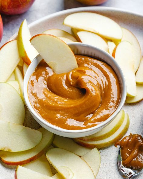 You won't believe this caramel apple dip recipe until you taste it! Stir just 4 ingredients into a glossy peanut butter caramel that's vegan and gluten-free. It's so simple and the best healthy snack! #appledip #dip #diprecipe #easysnack #healthysnack #snack #easysnackideas #snackidea #fallrecipe #fallsnack #dairyfreedip #dairyfreesnack #vegandip #vegansnack #healthydip #healthycaramel Healthy Caramel Dip, Keto Apple Dip, Dairy Free Apple Dip, Healthy Apple Dip Recipe, Healthy Apple Dip, Healthy Snack Mix, Apples And Peanut Butter, Caramel Apple Dip Recipe, Apple Dip Recipe