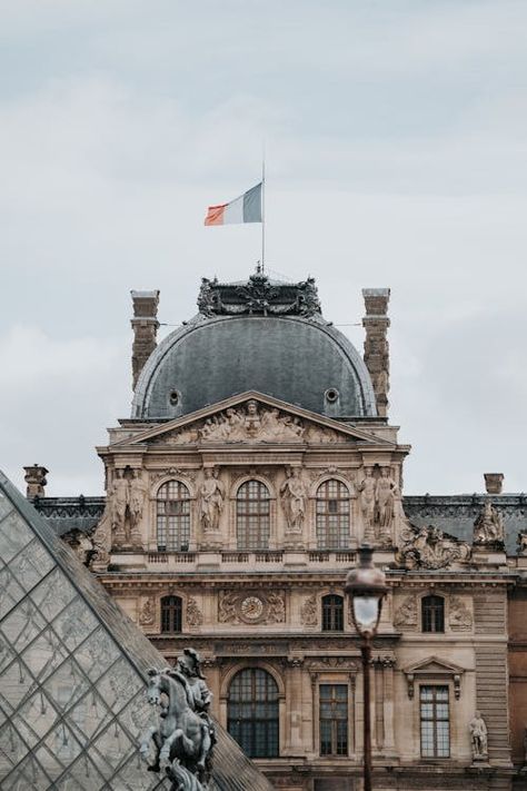 French Flag on the Roof of the Louvre Palace · Free Stock Photo Louvre Museum Aesthetic, Museum Facade, Louvre Palace, The Louvre Museum, Museum Aesthetic, French Flag, The Louvre, Louvre Museum, Academia Aesthetic