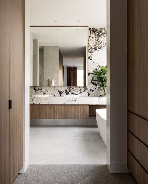 Laminex AU on Instagram: "The rich tones of Laminex Danish Walnut perfectly complement the statement marble in this walk-in wardrobe and bathroom design, creating a luxurious and cohesive space⁠.⁠ ⁠ Build: @Mazzeihomes⁠ Architect: @websterarchitecture⁠ Landscape: @nathanburkett.nbla⁠ Program: @rmhhomelottery⁠ Photographer: @dylanjamesphoto⁠" Sink Design, Chic Interior, Marble Tiles, Open Plan Kitchen, Bathroom Designs, Architecture Interiors, Bathroom Inspiration, Bathroom Interior Design, Bathroom Interior