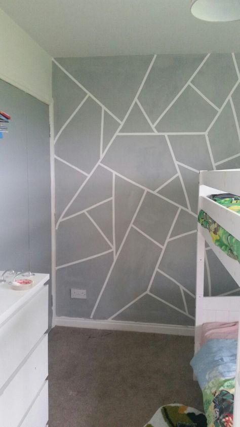 Masking tape feature wall in my boys bedroom Masking Tape Accent Wall, Abstract Tape Painting Accent Walls, Masking Tape Painting Walls Bedroom, Drawing Room Feature Wall, Masking Tape Wall Design, Triangle Wall Paint Bedrooms, Taped Wall Designs Painters, Masking Tape Wall Paint, Accent Wall Tape Designs