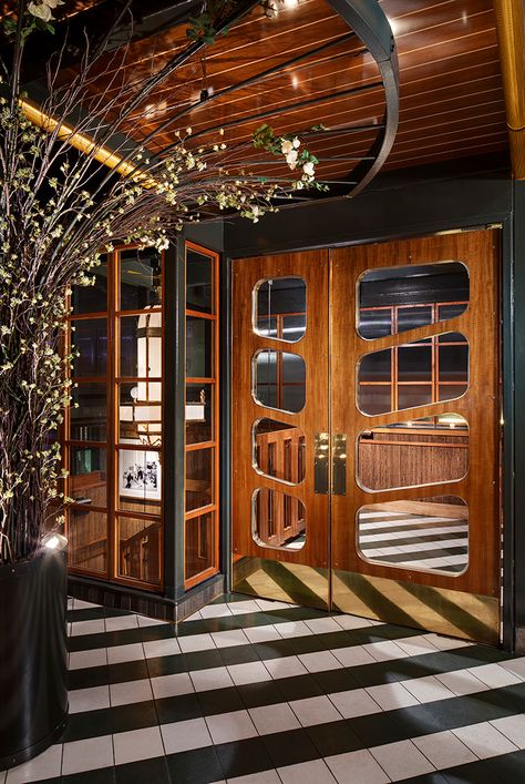 Art Deco doors of teak and brass lead to the downstairs dining room’s suspended steel staircase. Restaurant Doors, Restaurant Door, Art Deco Doors, Art Deco Door, Steel Door Design, Design Café, Art Deco Interior Design, Terrazzo Flooring, Bar Interior