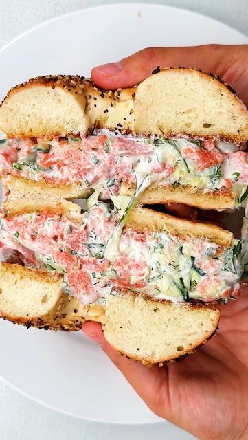 Carolina Gelen on Instagram: "SMOKED SALMON CUCUMBER SALAD - in an everything bagel: creamy, fresh, and perfect for lunch. Ingredients (1 serving) 1 small cucumber, thinly shaved using a peeler 3 smoked salmon slices, thinly sliced 2 tablespoons mayonnaise 2 tablespoons Greek yogurt A small bunch dill, thinly chopped 1 garlic clove, grated Kosher salt 1 to 2 teaspoons lemon juice Everything bagel, sliced in half Extra-virgin olive oil, for frying Kosher salt Instructions 1. In a large Smoked Salmon Cucumber, Salmon Cucumber, Salmon Bagel, Dill Salmon, Creamy Cucumber Salad, Small Cucumber, Lemon Salmon, Creamy Cucumbers, Garlic Clove