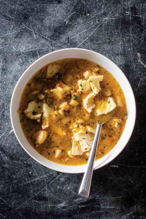 A simple fish stew that’s elegant yet effortless in that maddening French manner. (You know how French women just toss that scarf and it looks so elegant? Like that.) #fish #soup #french #healthy Feast Of The Seven Fishes, Poached Fish, Curry Seasoning, French Soup, Seven Fishes, Fish Stew, Fish Soup, French Dishes, French Cooking