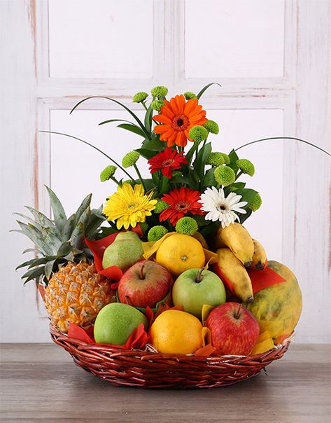 Awesome decorated fruit basket with flowers. It's amazing and neoteric of this year. Just let me know where you want to delivery. We are ready for shipping every where in Bangladesh. Fruit Flower Basket, Fruit Bouquet Ideas, Luau Party Food, Food Bouquet, Edible Bouquets, Fruit Basket Gift, Fruits And Flowers, Fruit Arrangements, Fruit Gifts