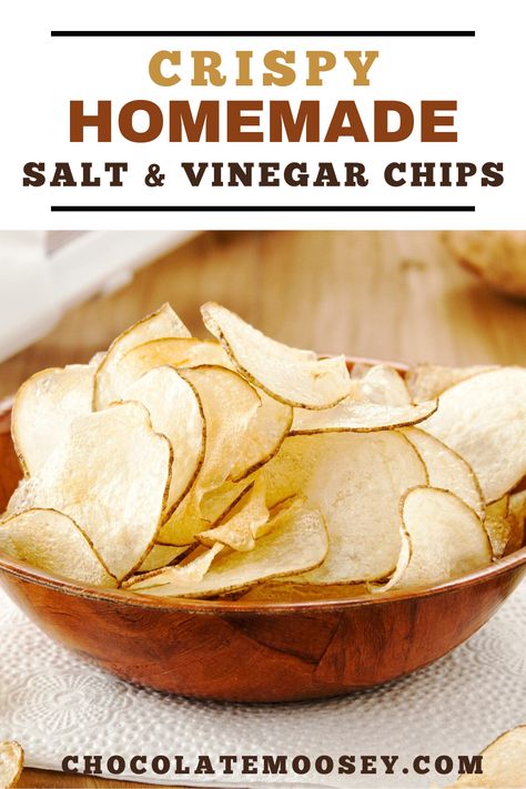 Crispy Homemade Salt & Vinegar Chips from scratch taste just like store-bought chips with their lip-smacking flavor thanks to one secret ingredient. Learn how to make baked salt and vinegar chips as well as frying them. Once they’re done cooking, let your chips cool in a single layer for a few minutes. If you pile them on top of each other, they may get soggy from the heat. Salt And Vinegar Chips Air Fryer, How To Make Salt And Vinegar Chips, Salt Vinegar Chips, Homemade Kettle Chips, Salt And Vinegar Chips Recipe, Homemade Salt And Vinegar Chips, Oven Potato Chips, Salt And Vinegar Chips, Chip Seasoning