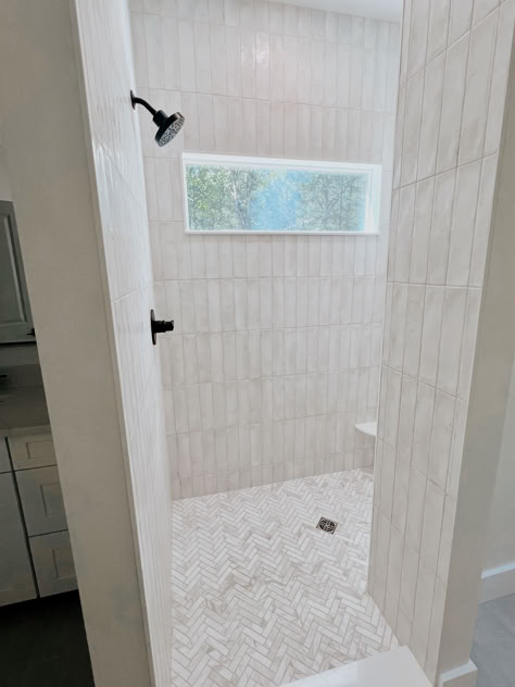 Master bath design. Shower tile. Bath tile. Herringbone tile. White tile bathroom. Walk in shower. Big Subway Tile Bathroom, White Herringbone Shower Tile, White Herringbone Shower, Chevron Bathroom Tile, Herringbone Shower Floor, River Bathroom, White Tile Bathroom, White Shower Tile, White Herringbone Tile