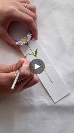 2.4M views · 354K reactions | A vague daisy bookmark tutorial inspired by the hayfever ravaging my body due to this breezy spring day. 

Glue stuff that you think needs gluing and make it as big as you want, those are my tips ✨

Happy crafting 🤍 | Kan | Zimmer90 · Summer Rain Paint Bookmarks, Daisy Bookmark, Bookmark Tutorial, Summer Rain, Spring Day, Craft Beer, Instagram A, Make It, You Think